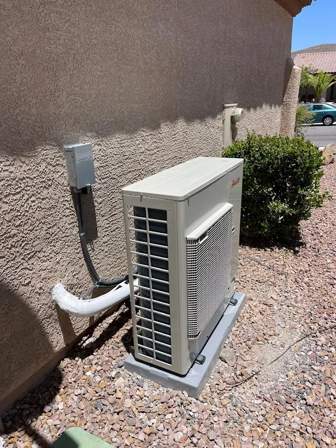 Residential air conditioning condenser unit in Nelson